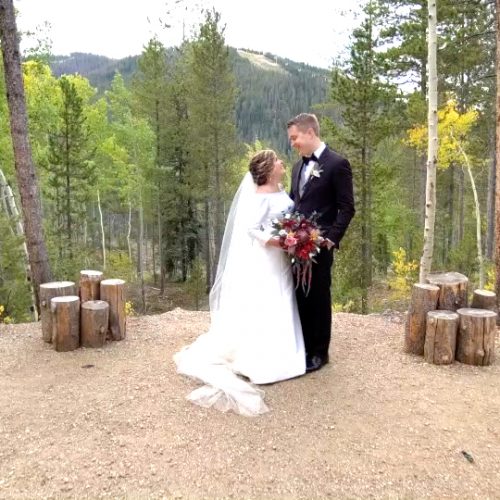 Wedding couple at the top of a hill